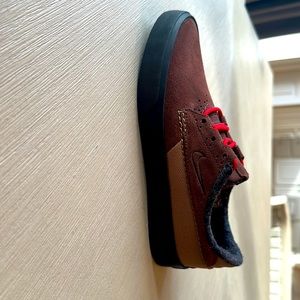 Brown tan and black leather nikes for boys size 4.5 perfect for the winter